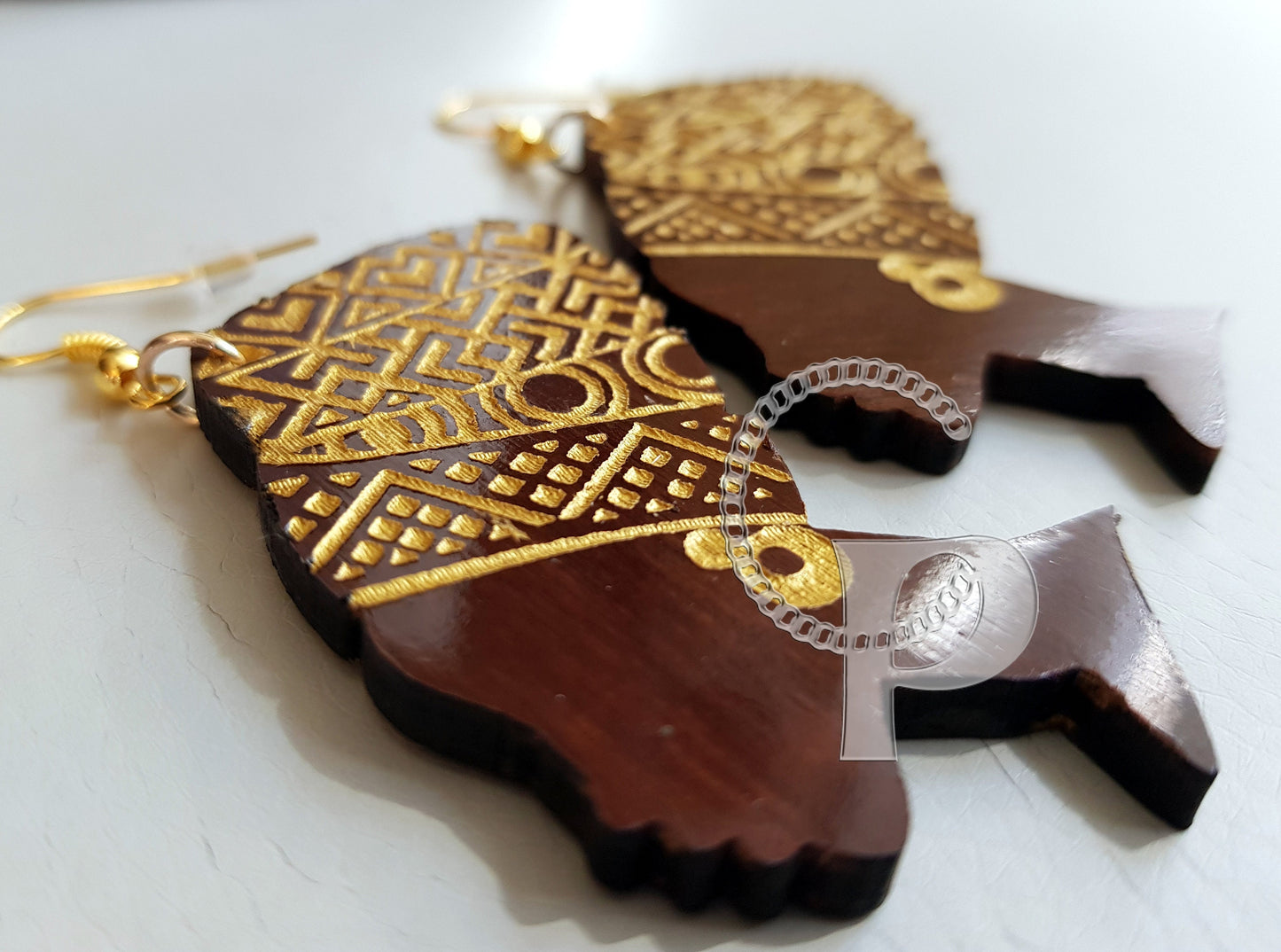 African woman Queen head wrap silhouette wooden engraved wood earrings brown and gold