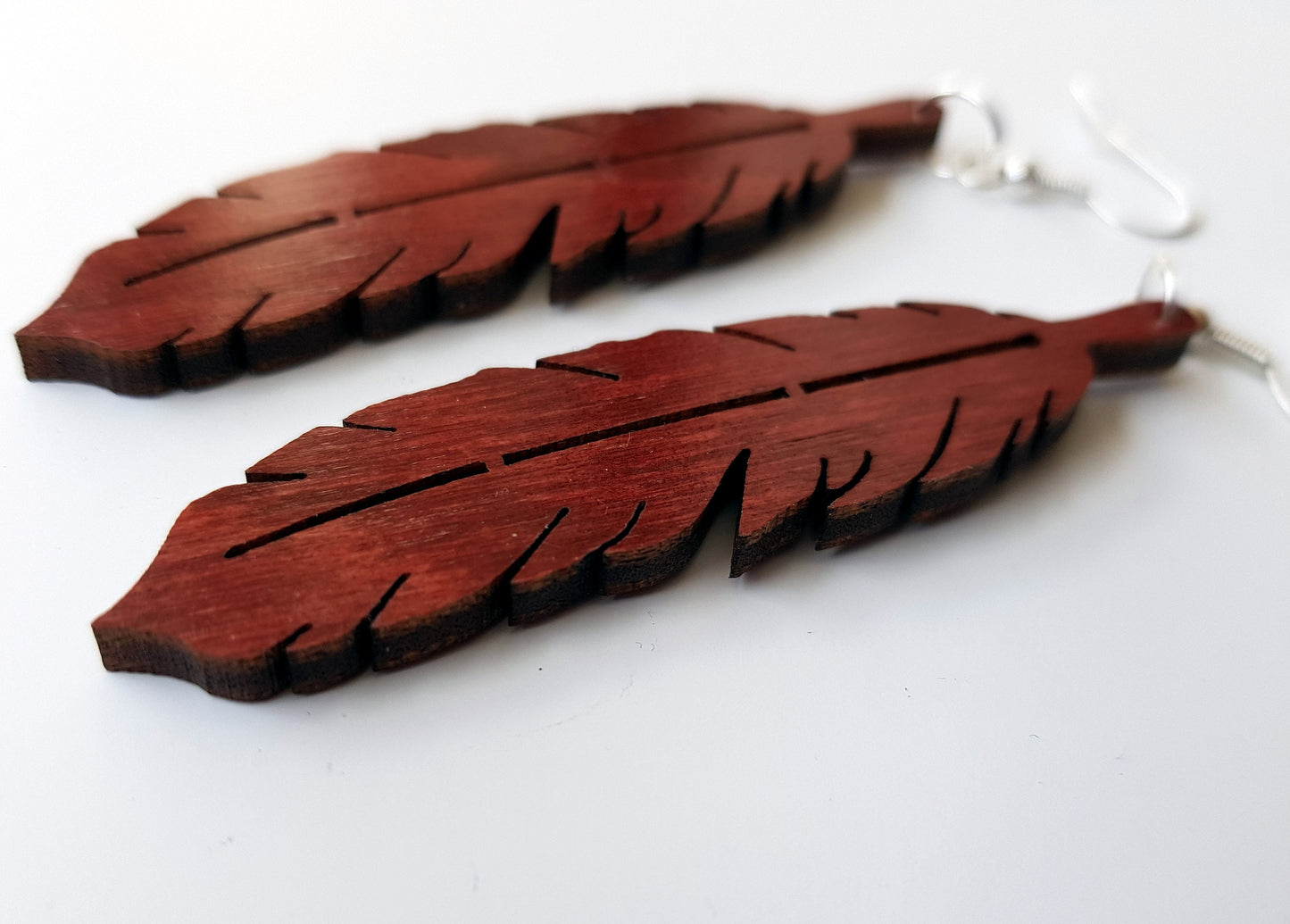 Laser cut wooden earrings feather shape in dark oak, ebony or mahogany