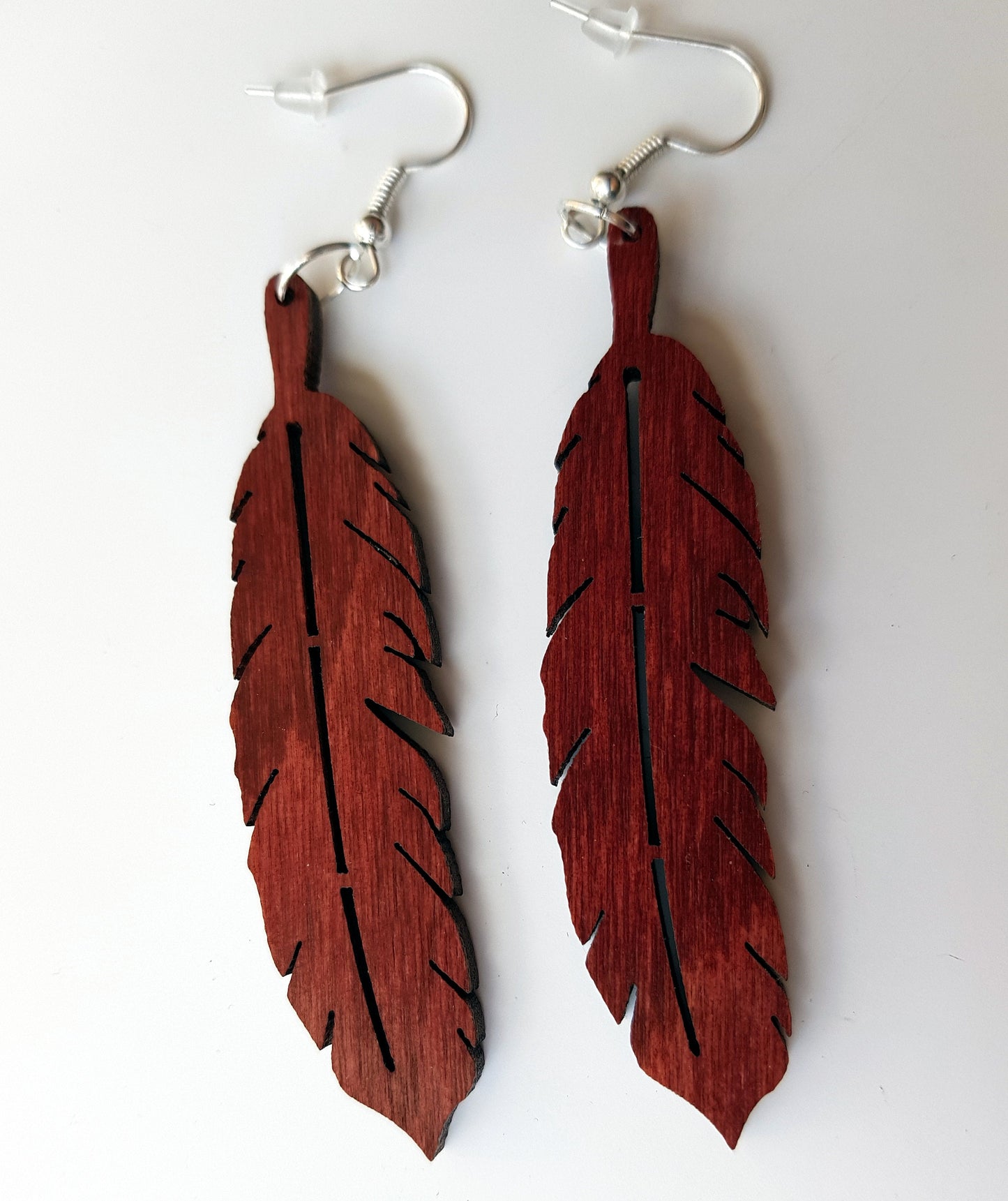 Laser cut wooden earrings feather shape in dark oak, ebony or mahogany