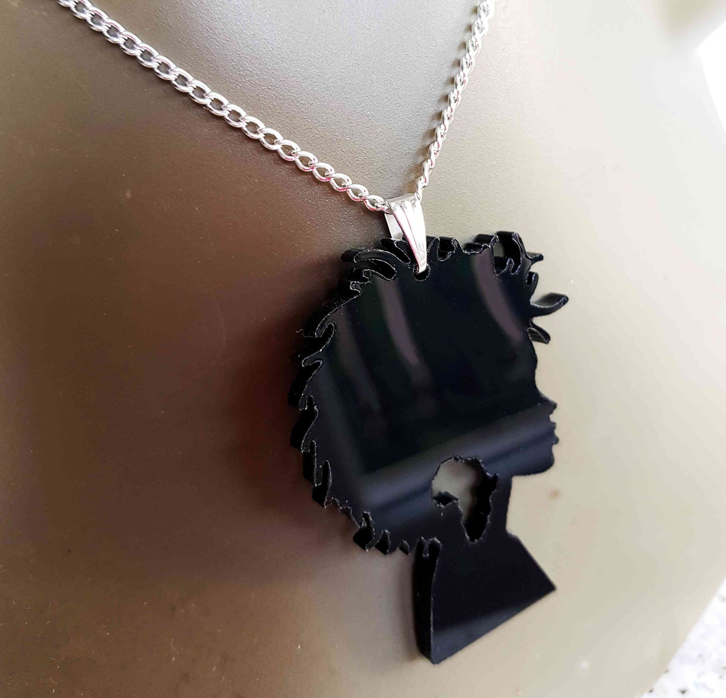 Acrylic Afro silhouette necklace in black African jewelry pendant