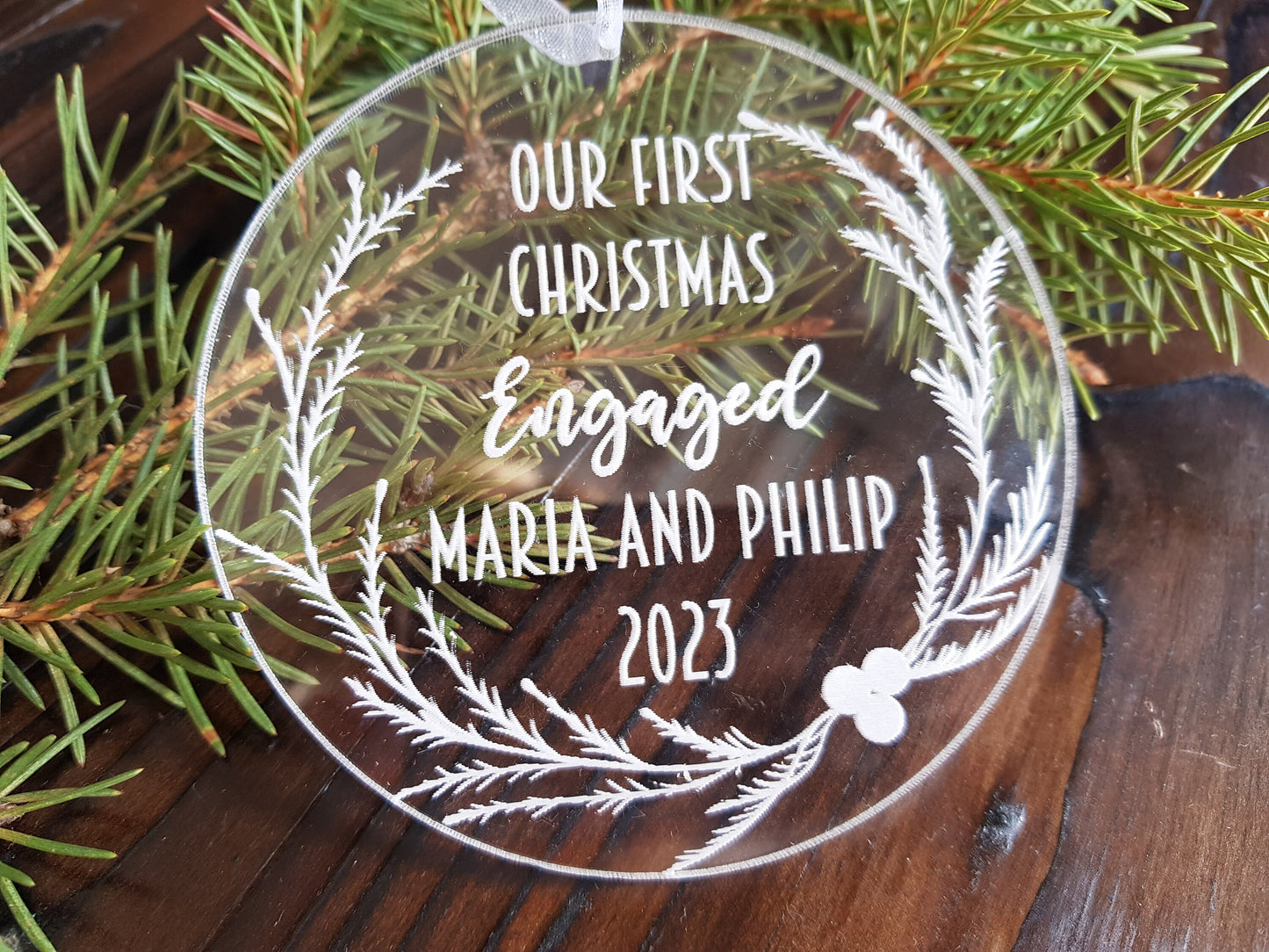 First Christmas ornament engraved personalized acrylic bauble with custom message engaged, married, baby