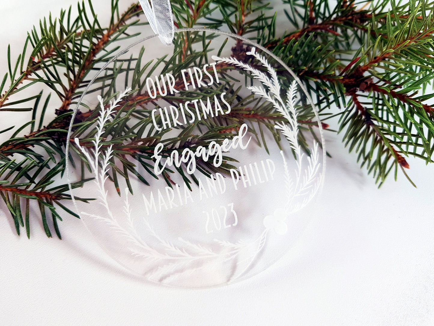 First Christmas ornament engraved personalized acrylic bauble with custom message engaged, married, baby