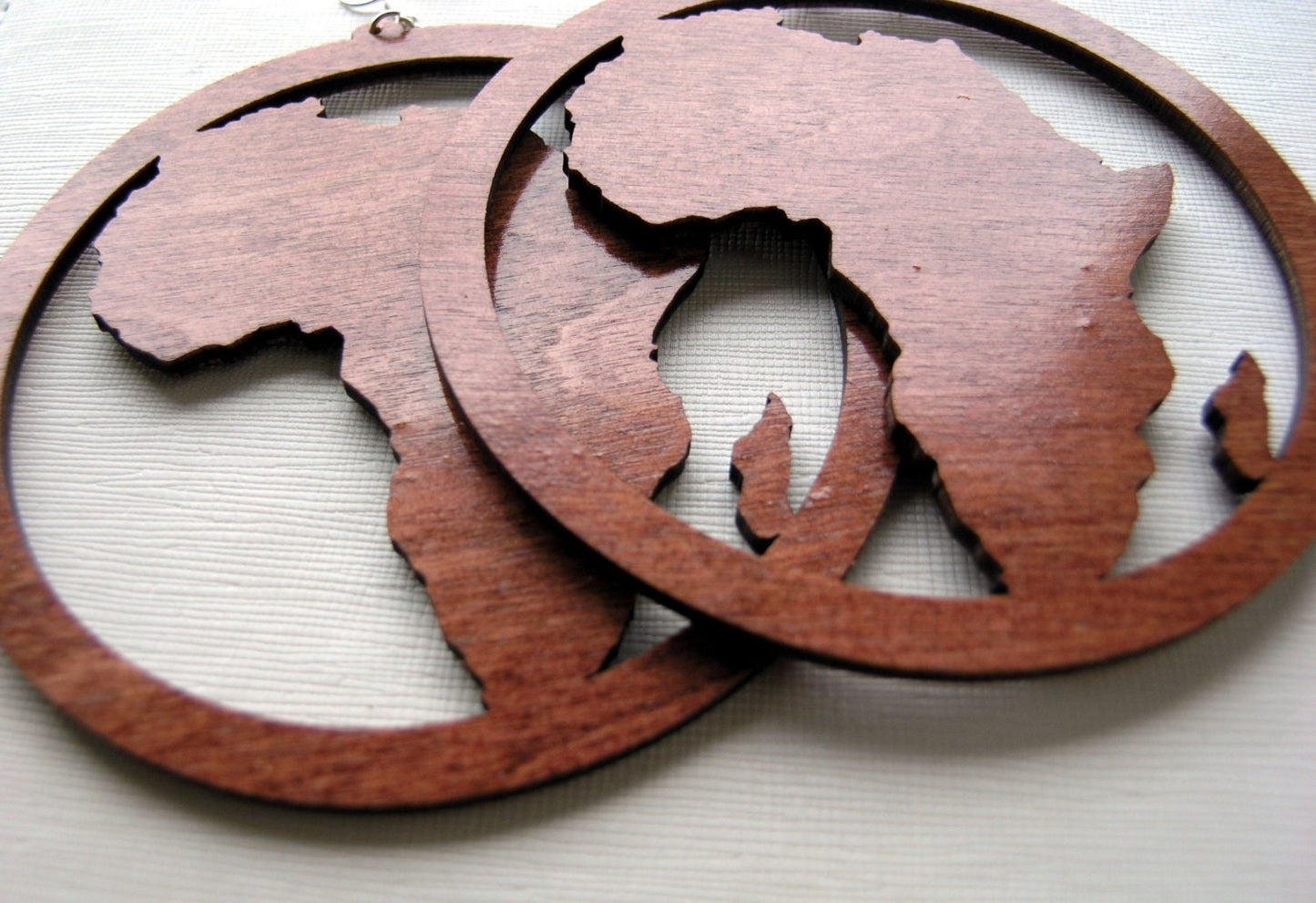 Laser cut wooden earrings Africa in a circle in deep mahogany, choice of sizes