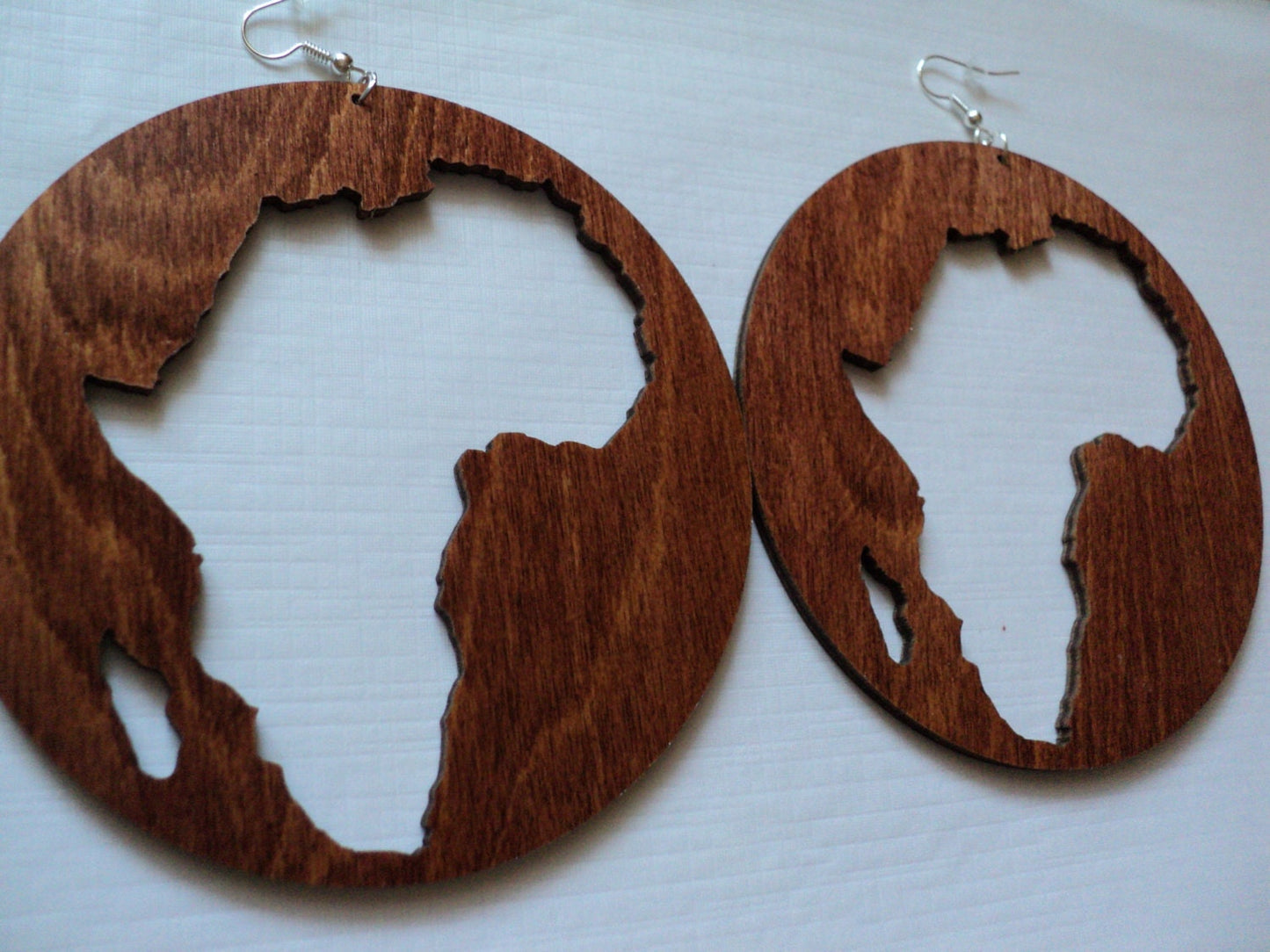 Laser cut wooden earrings Africa cut out in a circle in deep mahogany, choice of sizes