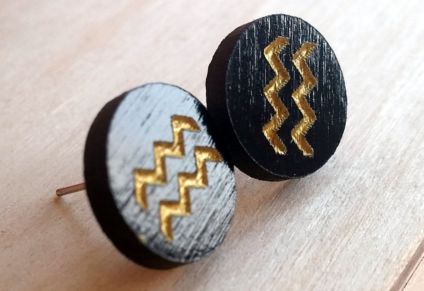 Small wooden stud earrings etched engraved hand painted zodiac signs black and gold. Free postage.