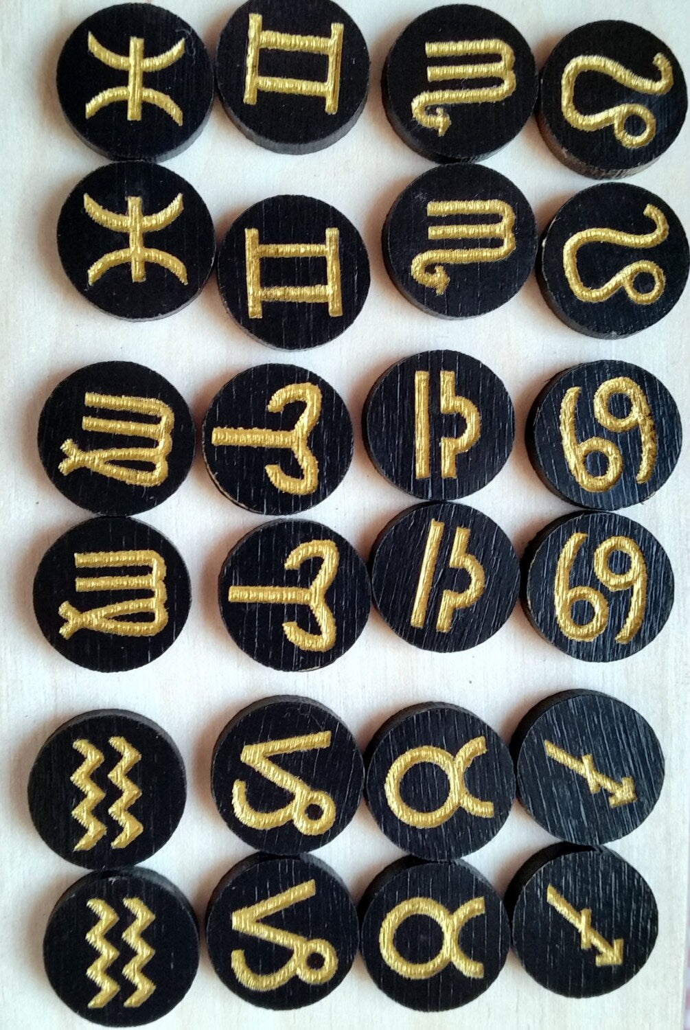 Small wooden stud earrings etched engraved hand painted zodiac signs black and gold. Free postage.