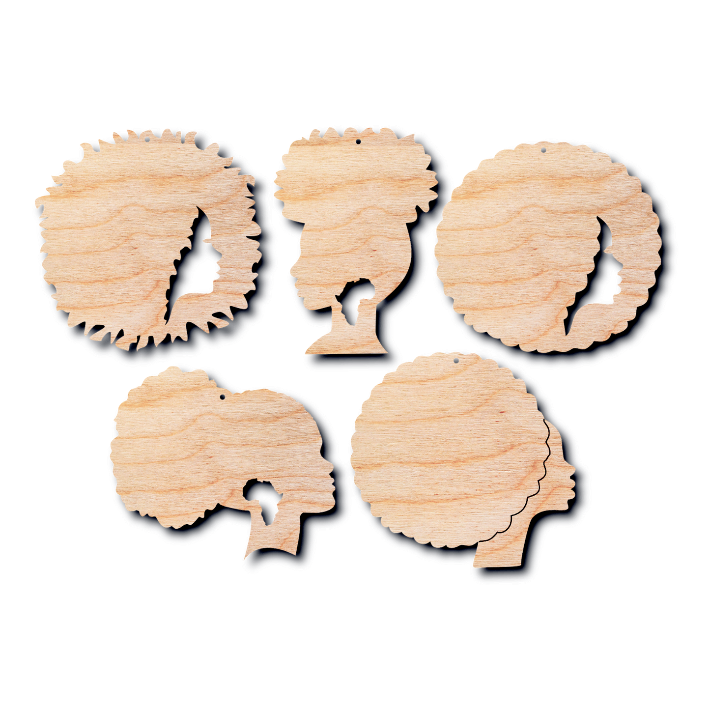 5 wooden shapes of a women's head silhouetes with Afro hairstyles on a white background