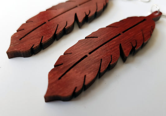 Laser cut wooden earrings feather shape in dark oak, ebony or mahogany